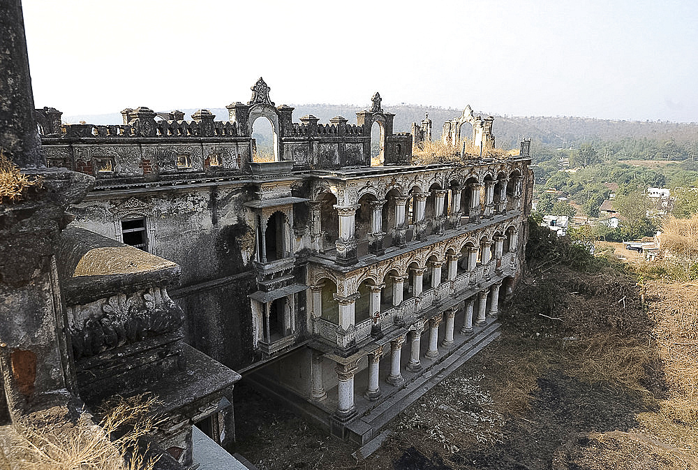 Ruins of the largely derelict but beautiful ornate 19th century royal Raj Mahal, high in the hills of Santrampur, Gujarat, India, Asia