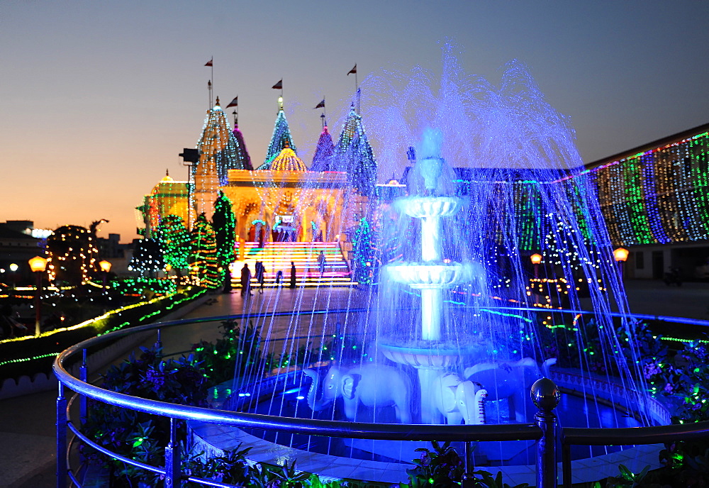 Diwali festival lights illuminating the beautiful white marble Swaminarayan Temple, Mandvi, Gujarat, India, Asia