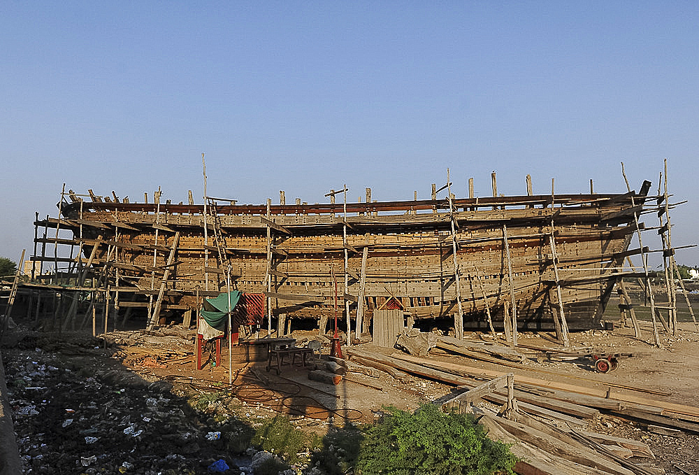 Ocean going dhow, constructed by hand from Sal wood in 400 year old tradition, on the Rukmavati River, Mandvi, Gujarat, India, Asia