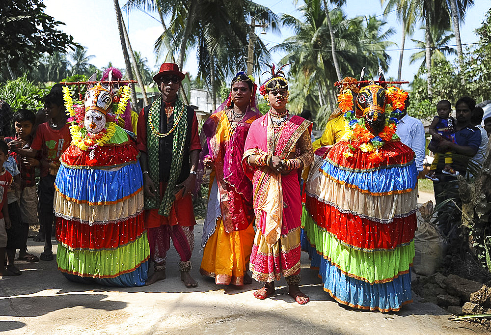 Group of traditional Chaiti Ghoda (Dummy Horse) dancers who perform dances at village events, Odisha, India, Asia