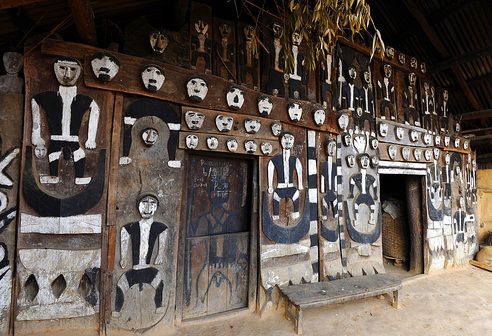 Traditional Naga village house front, decorated with tribal head-hunting icons, Mao Maram, Manipur, India, Asia