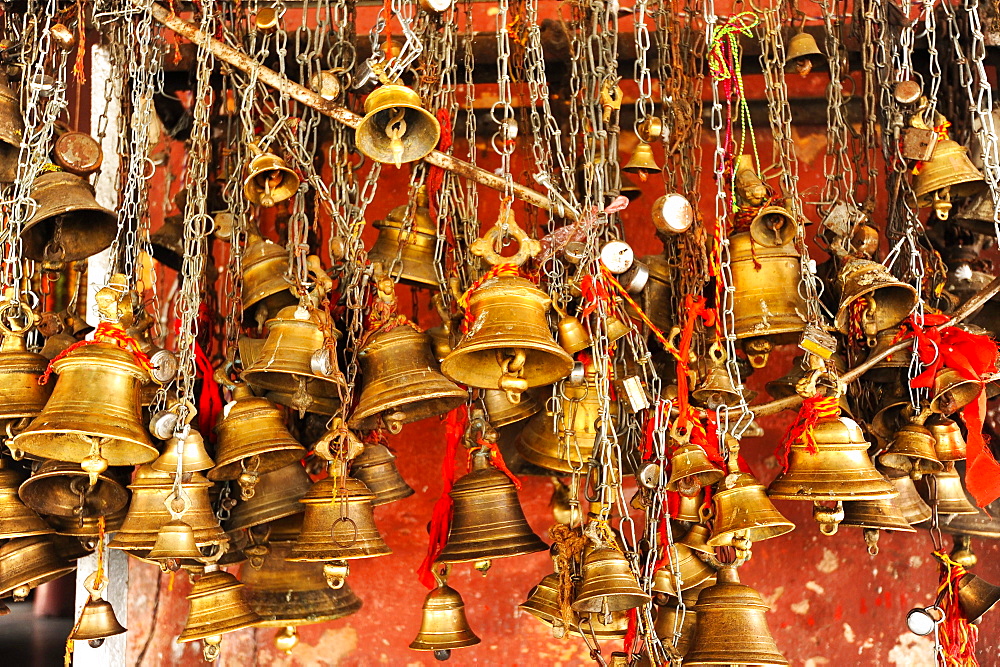 Ritual bells for worshippers at the entrance to the Hindu Sivadol temple, Sivasagar, Assam, India, Asia