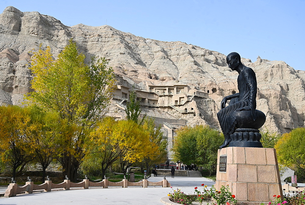 Statue of Kumarajiva, 4th century Buddhist monk from Kuche, at Kizil Caves, Xinjiang, China, Asia