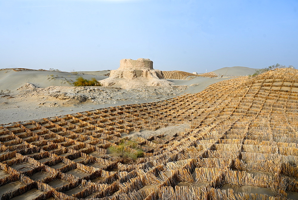 Straw sand control barriers around the 4th century Rawak Buddhist stupa, Hotan, Xinjiang, China, Asia