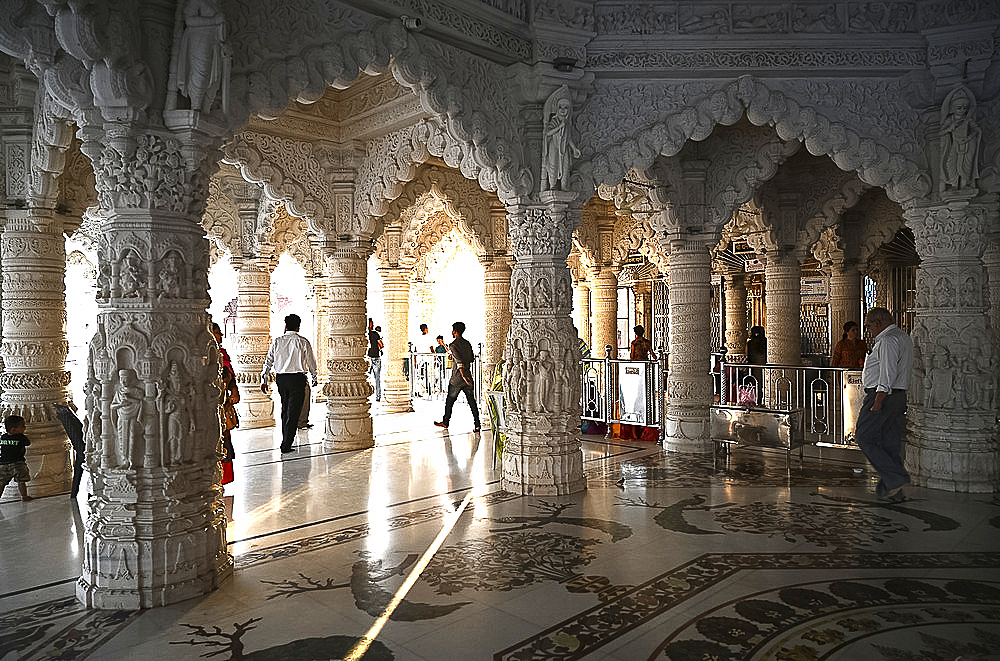 Visitors to the white marble Swaminarayan temple, built following the 2001 earthquake, Bhuj, Gujarat, India, Asia