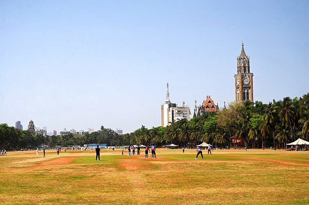 At least five cricket matches being played on the Azad Maidan, formerly known as Bombay Gymkhana Maidan in the city centre, Mumbai, India, Asia