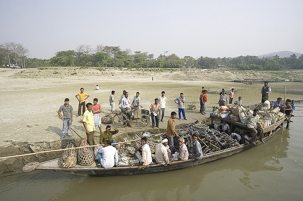 Ferry being loaded for journey across the Brahmaputra River, Assam, India, Asia