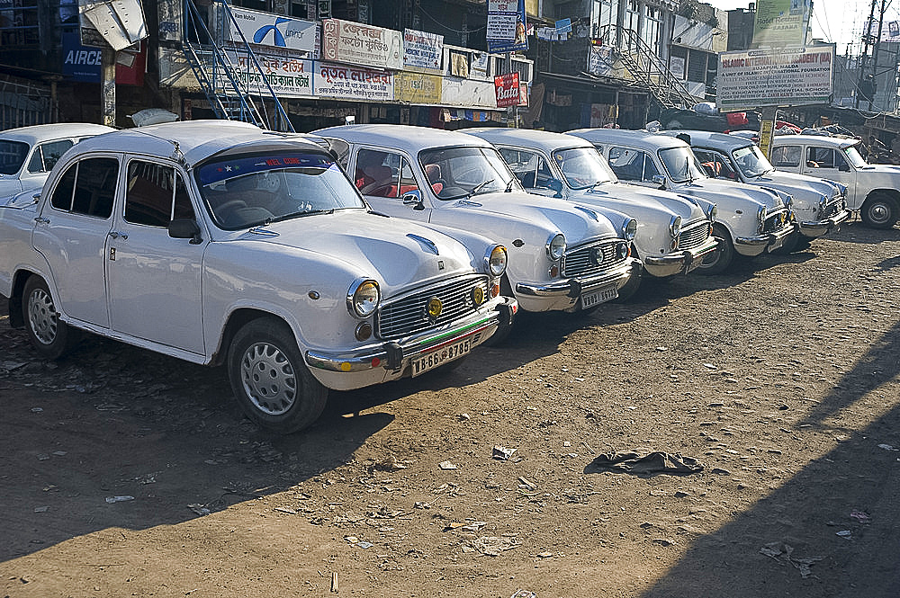 Ambassador cars lined up at the roadside, Malda (English Bazaar), West Bengal, India, Asia