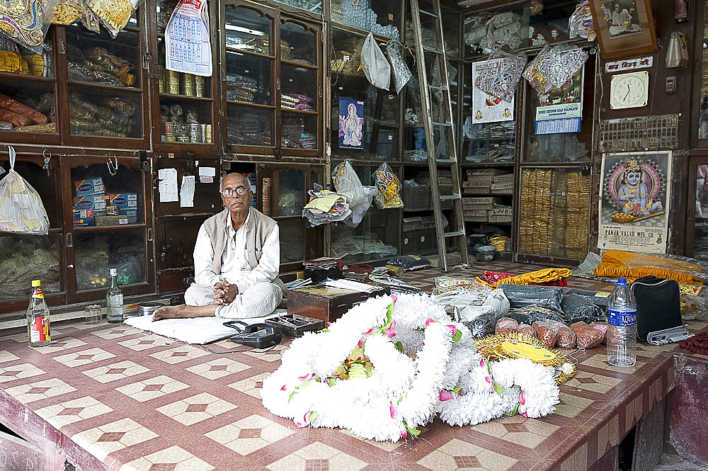 Shop owner in the Kumartuli district of Kolkata, West Bengal, India, Asia