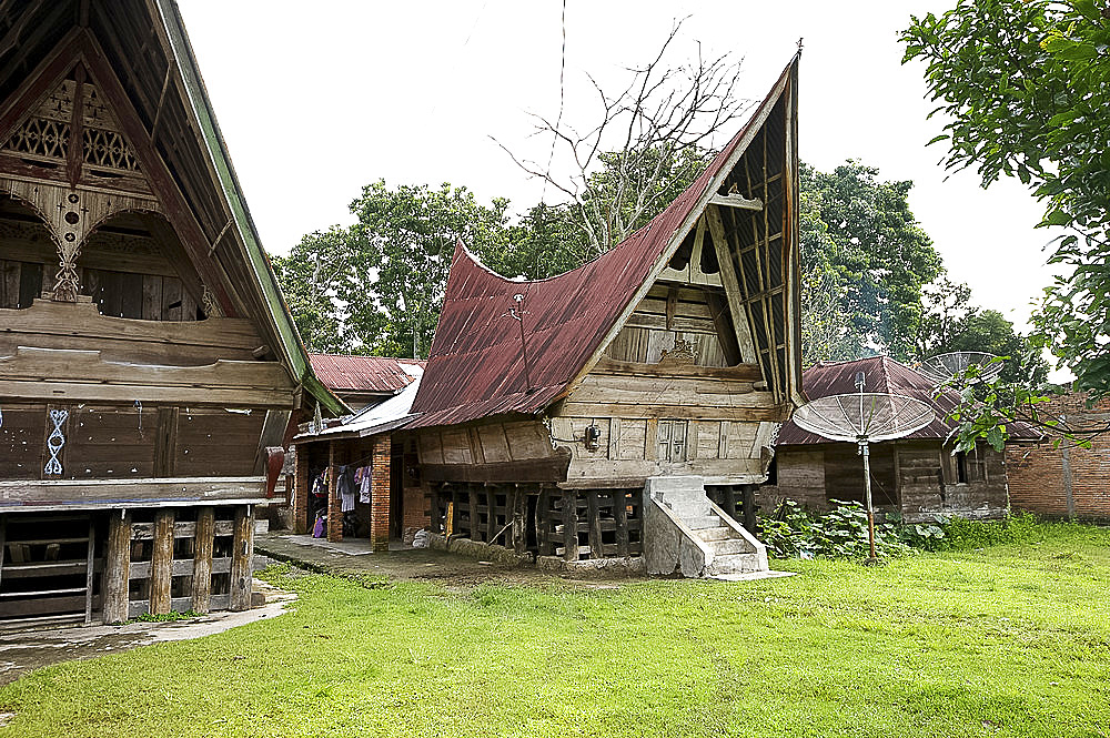 Batak Toba tribal rural village houses on Samosir Island in Lake Toba, Sumatra, Indonesia, Southeast Asia, Asia