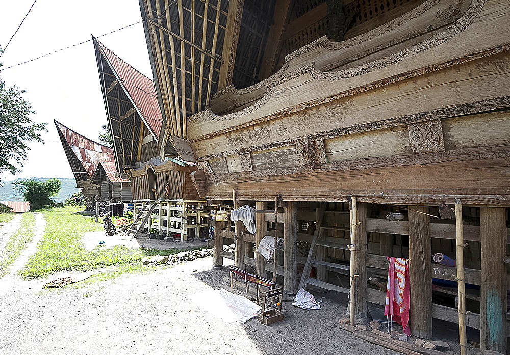 Batak style village houses in Buhit, a weavers village in rural Samosir Island, Lake Toba, Sumatra, Indonesia, Southeast Asia, Asia