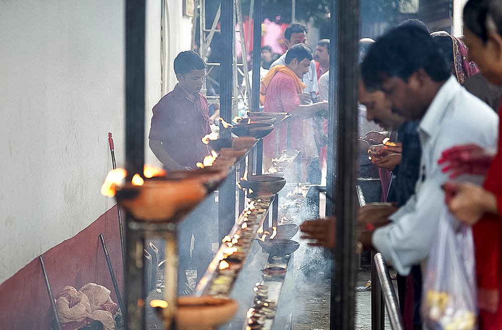 Terracotta diya (oil lamps) offered as a temple puja by pilgrims and devotees, Kamakhya temple, Guwahati, Assam, India, Asia