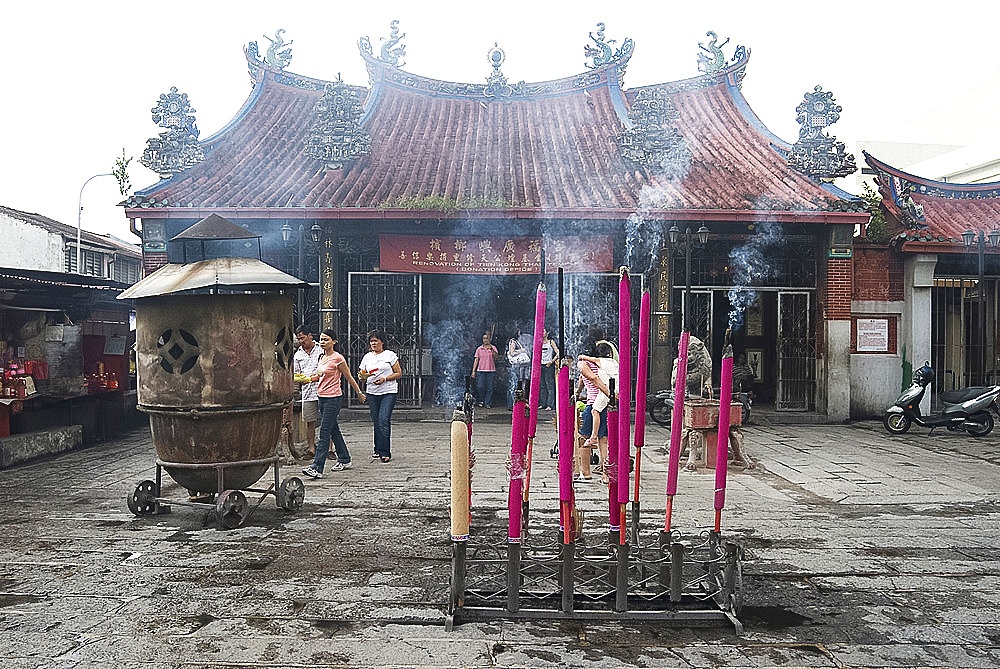 Devotional incense sticks burning outside the Goddess of Mercy Chinese temple (Kuan Yin Teng), built in 1728 by Chinese settlers, Georgetown, Penang, Malaysia, Southeast Asia, Asia