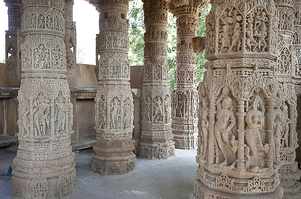 Carved pillars at Solanki dynasty Modhera Sun Temple, built in 1026 and dedicated to the Hindu sun god Surya, Modhera, Gujarat, India, Asia