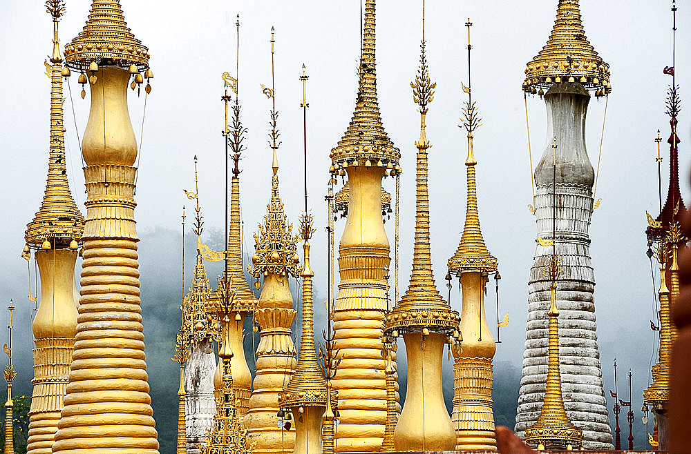 Golden pagodas at the Nyaung Oak monastery in Indein, the largest and oldest monastery on Inle Lake, Shan state, Myanmar (Burma), Asia