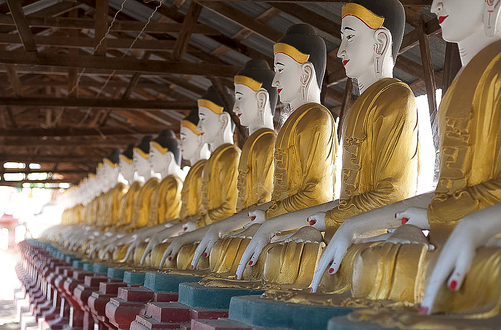 Line of seated Buddhas at the Maha Bodhi Ta Htaung monastery, Monywa township, Sagaing Division, Myanmar (Burma), Asia