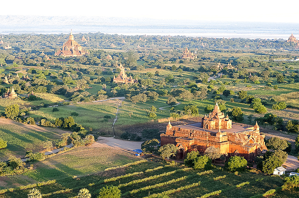 Early morning sunshine over the terracotta temples of Bagan, the Irrawaddy river in the distance, Bagan (Pagan), Mandalay Division, Myanmar (Burma), Asia