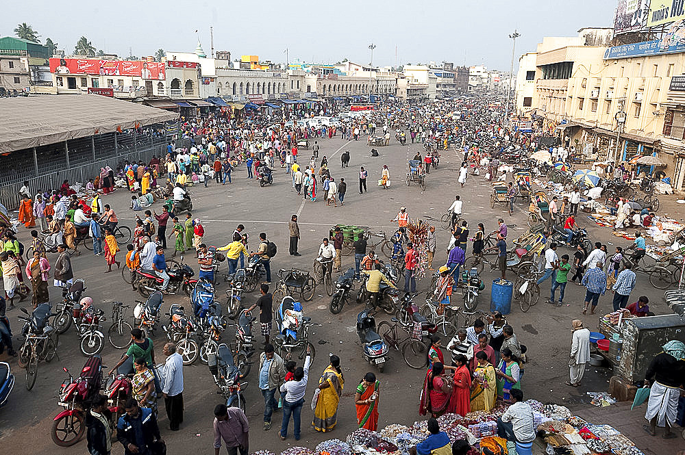 Puri town centre showing busy main street, shops and marketplace near Jagannath Temple to Lord Vishnu, Puri, Odisha, India, Asia