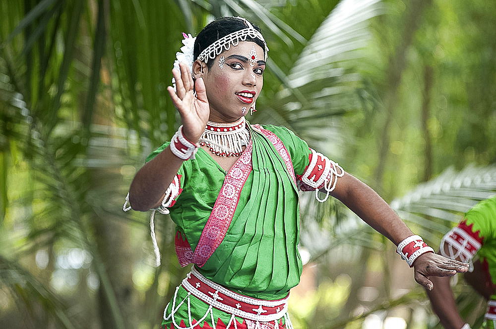 Young boy performing Gotipua dance, the traditional folk dance of Odisha inspired by Hindu gods, Lords Jagannath and Krishna, Odisha, India, Asia