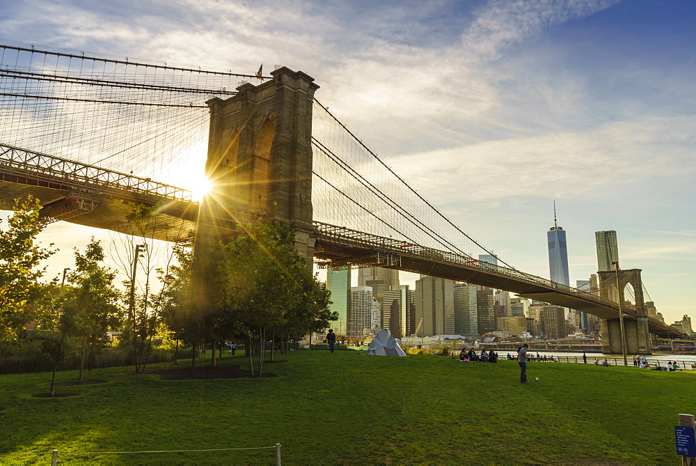 Brooklyn Bridge and Lower Manhattan skyline at sunset, New York City, New York, United States of America, North America