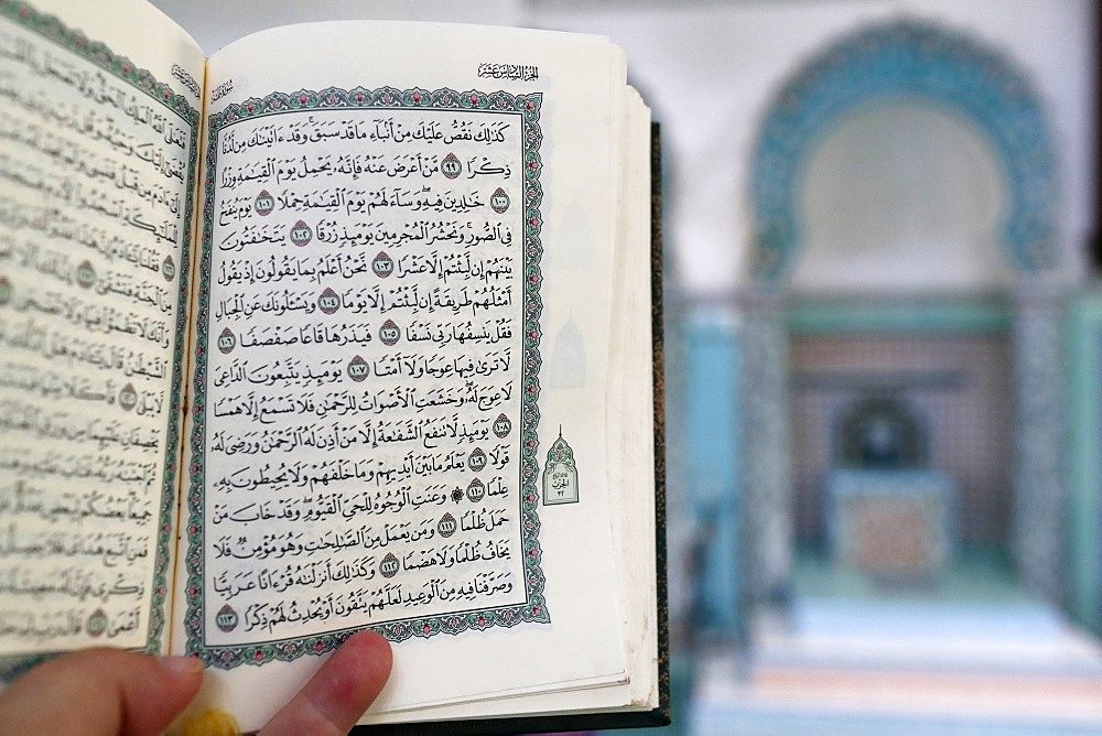 Mubarak Mosque, Muslim man reading an Arabic Holy Quran (Koran), Chau Doc, Vietnam, Indochina, Southeast Asia, Asia