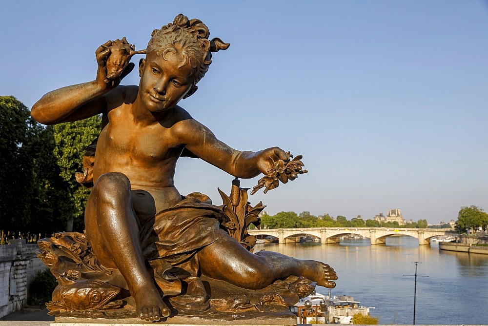 Statue on Alexander III bridge, Paris, France, Europe