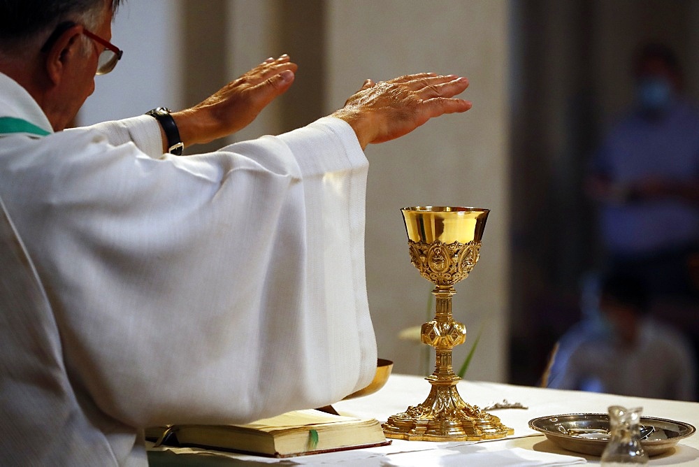 Catholic church during covid-19 epidemic, Sunday Mass, Holy Communion, Saint Gervais, Haute-Savoie, France, Europe