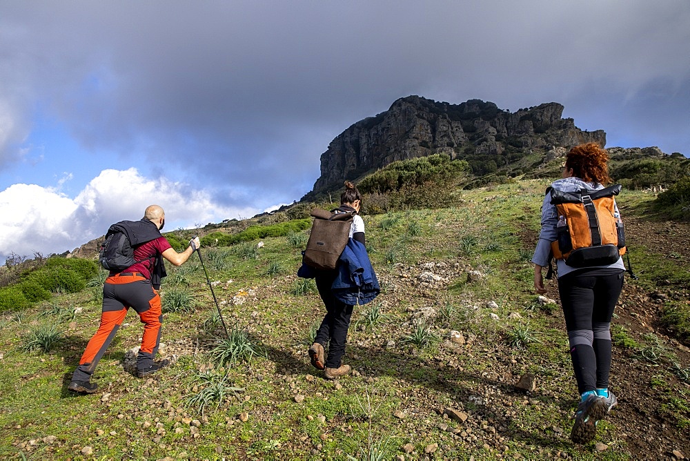 Trekkers on Arcuentu mountain, Sardinia, Italy, Europe