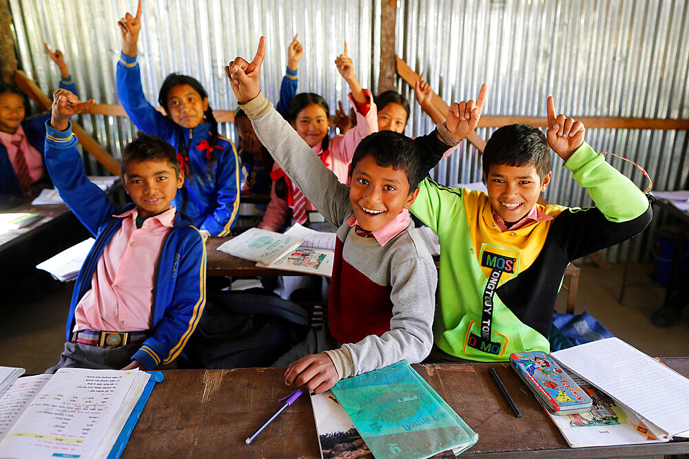 Primary school classroom with smiling children, Lapilang, Dolakha, Nepal, Asia