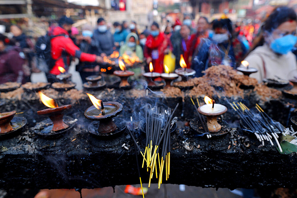 Oil (butter) lamps burning in Hindu temple, Kathmandu, Nepal, Asia