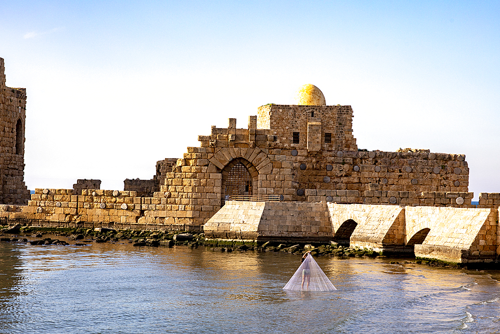 Fisherman near Saida fort, Lebanon, Middle East