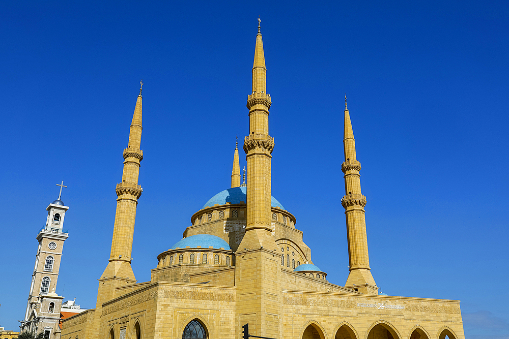 St. George Maronite Cathedral bell tower and Mohammed al-Amine Sunni Mosque, Beirut, Lebanon, Middle East