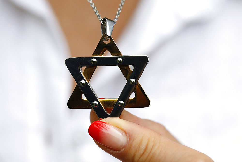 Woman wearing a Star of David (Jewish Star) pendant, Vietnam, Indochina, Southeast Asia, Asia