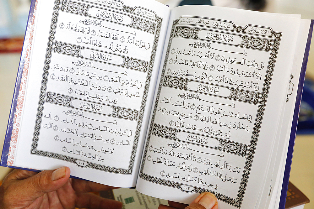 Masjid Nia'mah Mosque, Muslim man reading the Holy Quran, Chau Doc, Vietnam, Indochina, Southeast Asia, Asia