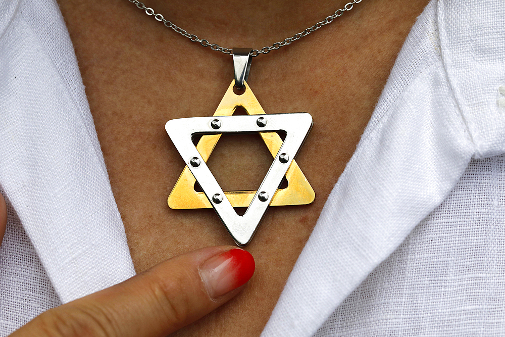 Woman wearing a Star of David (Jewish Star) pendant, Vietnam, Indochina, Southeast Asia, Asia