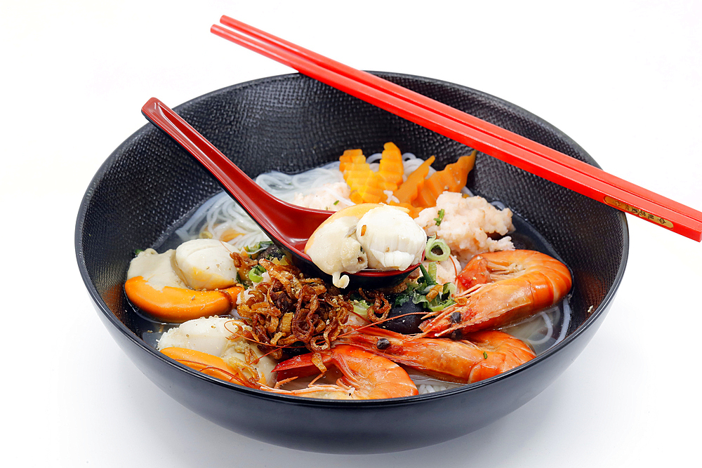 Fresh sea food, Vietnamese soup served in a black bowl, Asian kitchen, France, Europe