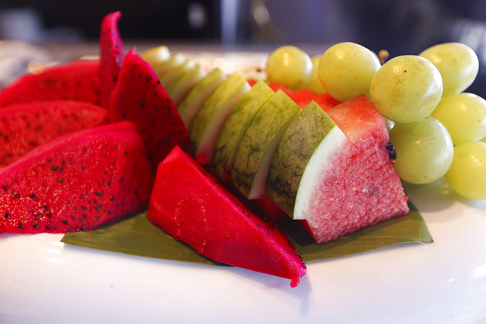 Fresh fruit on food buffet in a restaurant, Ho Chi Minh City, Vietnam, Indochina, Southeast Asia, Asia