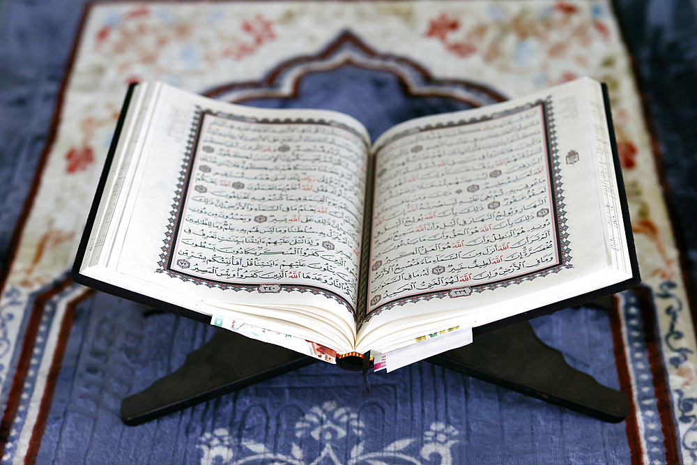 Open Quran in Arabic on wood stand, Symbol of Islam, Mubarak Mosque, Chau Doc, Vietnam, Indochina, Southeast Asia, Asia