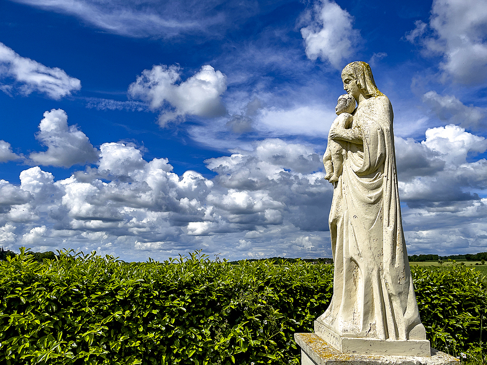 Virgin and Child statue, in a Normandy landscape, Eure, Normandy, France, Europe