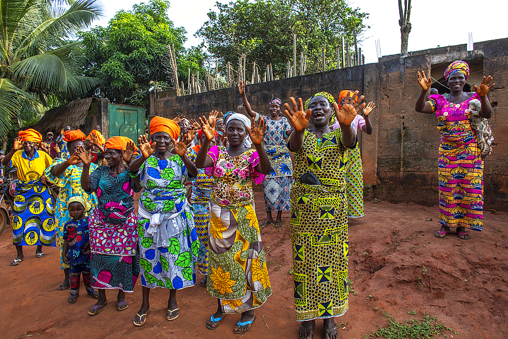 Women's group waving goodbye in Dokoue, Benin, West Africa, Africa