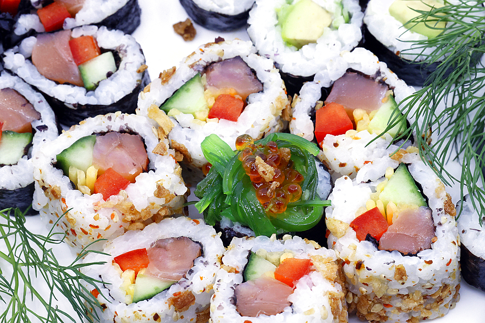 Different Japanese rolls and sushi on a plate, Japanese food, France, Europe