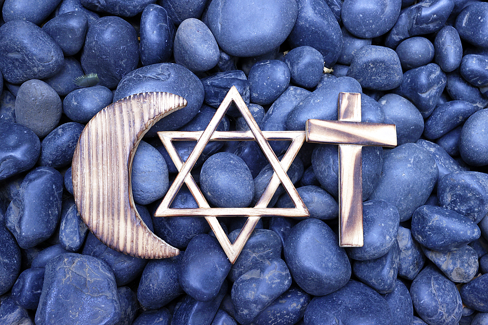 Christianity, Islam and Judaism : the three monotheistic religions. Jewish Star, Christian Cross and Muslim Crescent. Interreligious and interfaith dialogue.