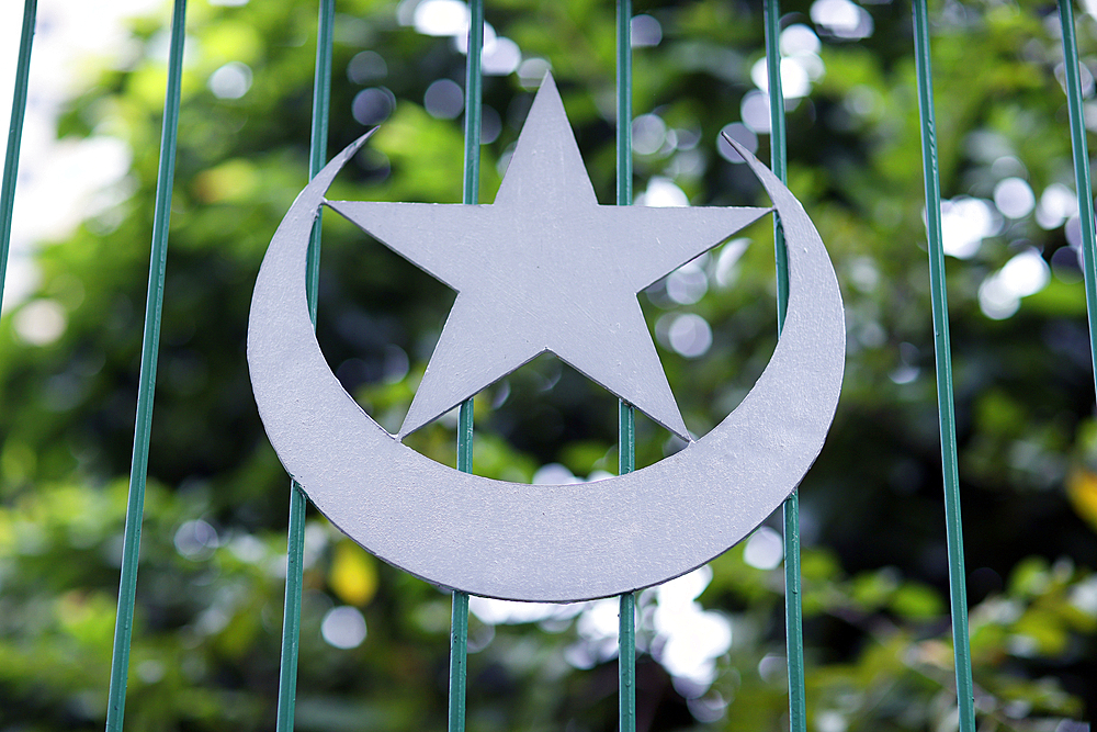 Star and crescent, symbol of Islam on a Mosque railing, Ho Chi Minh City, Vietnam