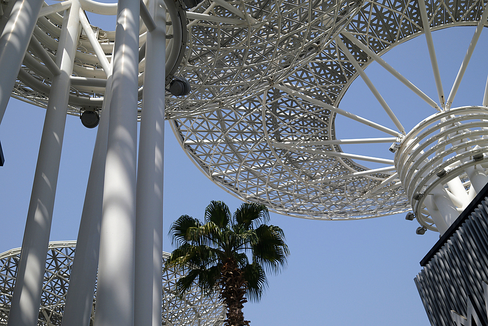 Modern artificial tree constructions and shopping street on Dubai Bluewaters Island. Dubai, UAE, United Arab Emirates.