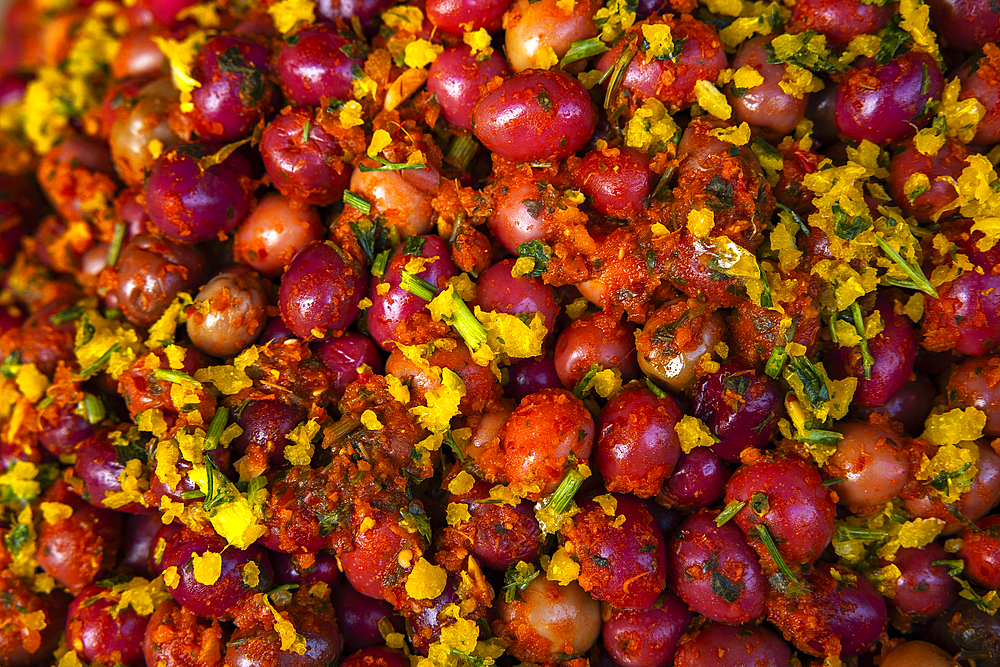 Olives sold in Sale, Morocco. Lemons, tangerines and potatoes