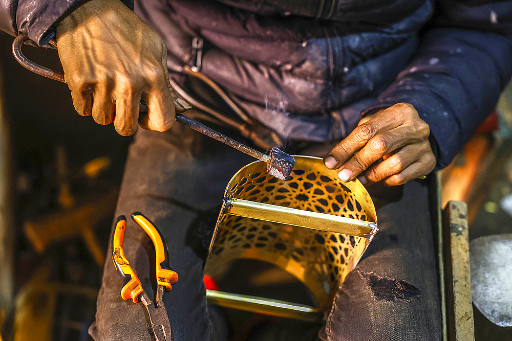 Craftsman at work in a workshop in Marrakesh, Morocco