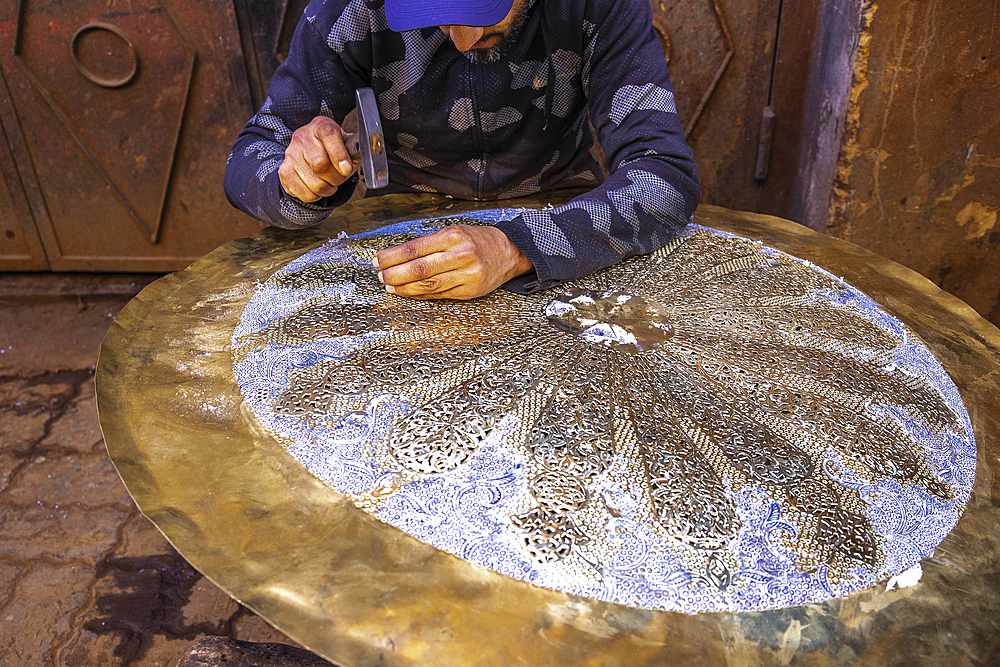 Craftsman at work in a workshop in Marrakesh, Morocco