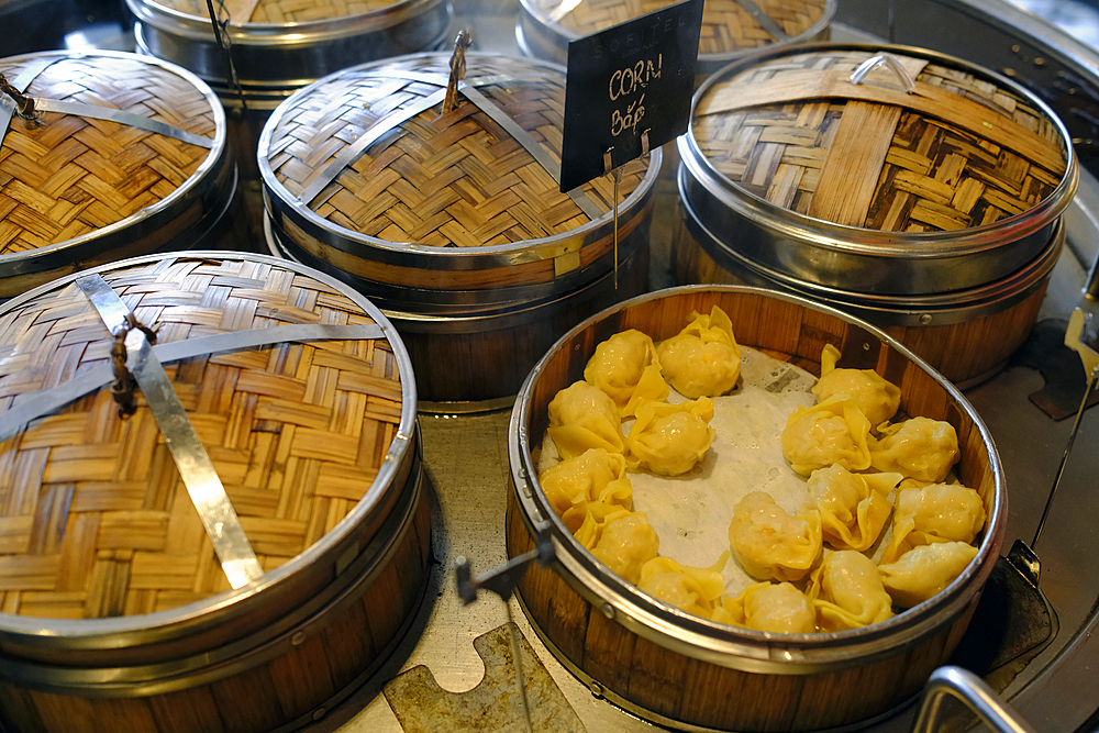 Dim sum and dumpling buffet in a restaurant. Steamer baskets.