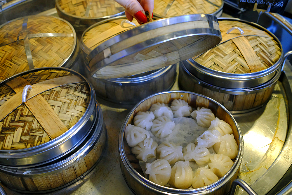 Dim sum and dumpling buffet in a restaurant. Steamer baskets.