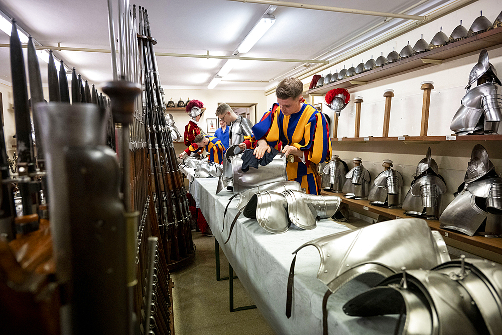 Swiss Guards take part in a swearing-in ceremony in San Damaso Courtyard, Vatican city.